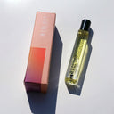 Biology Immunity Rollerball Perfume and box shown from an angled top-down view